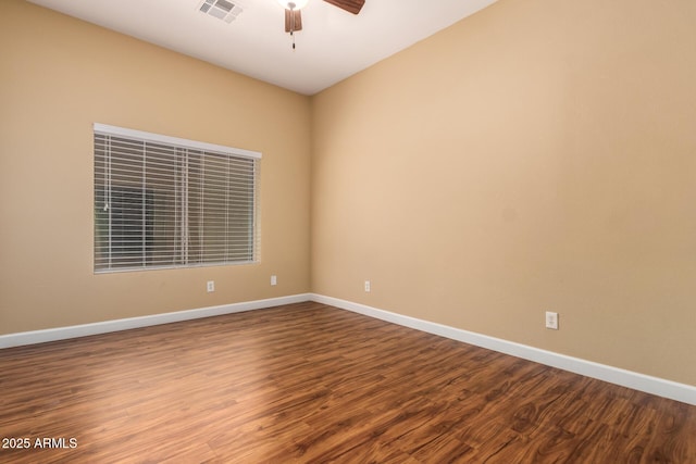 18650 N 91st Ave Unit 3301, Peoria, AZ 85382 - spare room featuring a ceiling fan, dark wood finished floors, and baseboards
