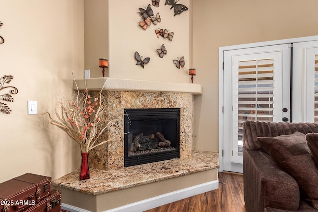18650 N 91st Ave Unit 3301, Peoria, AZ 85382 - detailed view of wood finished floors and a fireplace