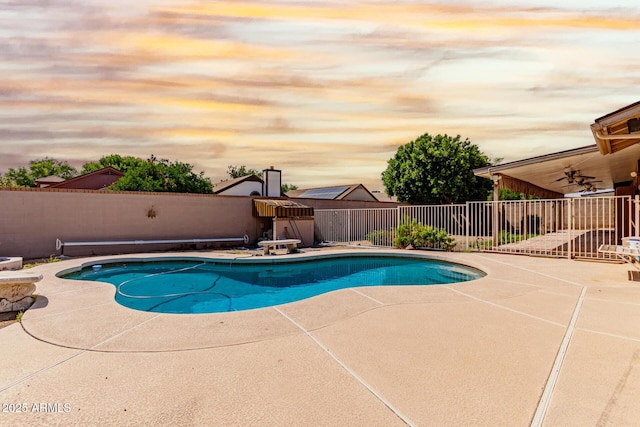 view of swimming pool featuring a patio area and a fenced backyard