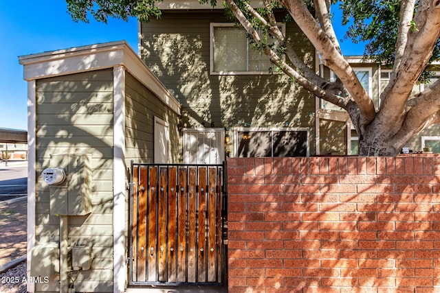 view of side of property with fence