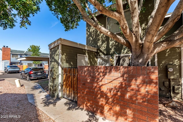 exterior space with a gate and fence