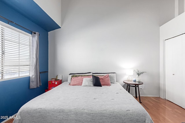 bedroom with wood finished floors