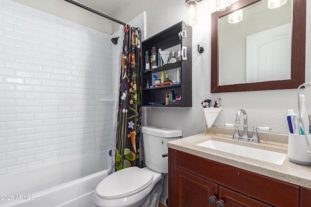 full bath with vanity, toilet, shower / tub combo with curtain, and a textured wall