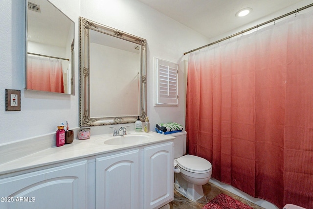 bathroom featuring tile patterned floors, visible vents, toilet, a shower with curtain, and vanity