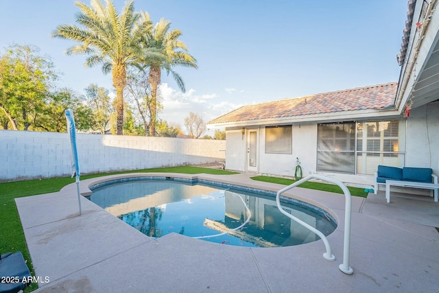 view of pool with a patio area, a fenced backyard, and a fenced in pool