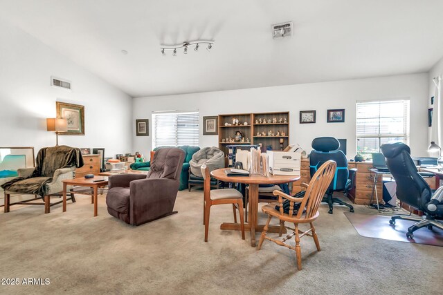 871 N Granada Dr, Chandler, AZ 85226 - dining space with light carpet, an office area, and lofted ceiling