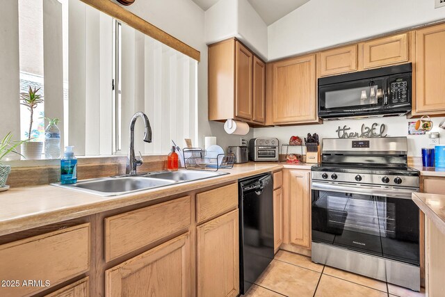 871 N Granada Dr, Chandler, AZ 85226 - kitchen with black appliances, a sink, light countertops, and light tile patterned floors