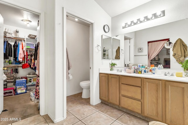 871 N Granada Dr, Chandler, AZ 85226 - bathroom featuring tile patterned flooring, double vanity, and toilet