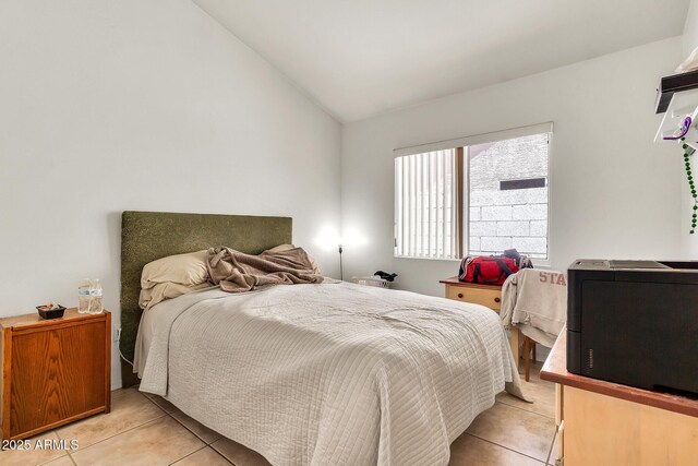 871 N Granada Dr, Chandler, AZ 85226 - bedroom featuring light tile patterned flooring and vaulted ceiling