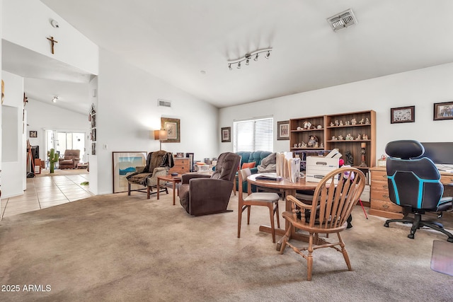 871 N Granada Dr, Chandler, AZ 85226 - dining space featuring light carpet, lofted ceiling, a desk, and light tile patterned floors