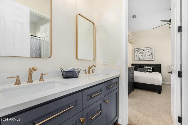 bathroom with vanity and ceiling fan