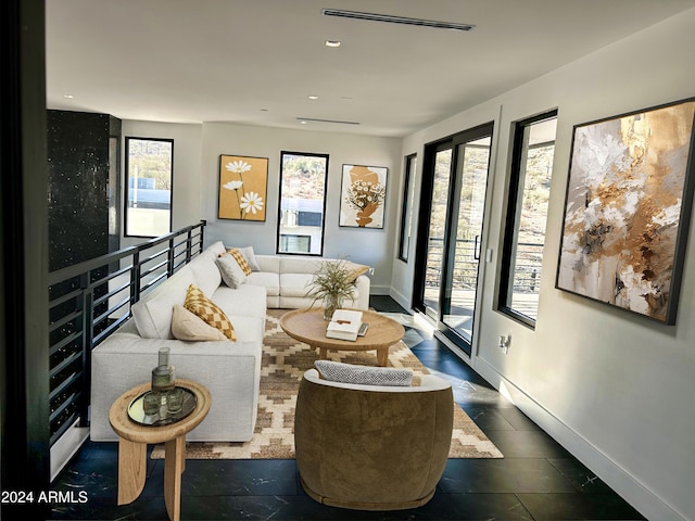 living room featuring a wealth of natural light