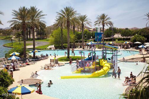 view of swimming pool featuring a water slide