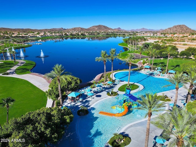 bird's eye view featuring a water and mountain view