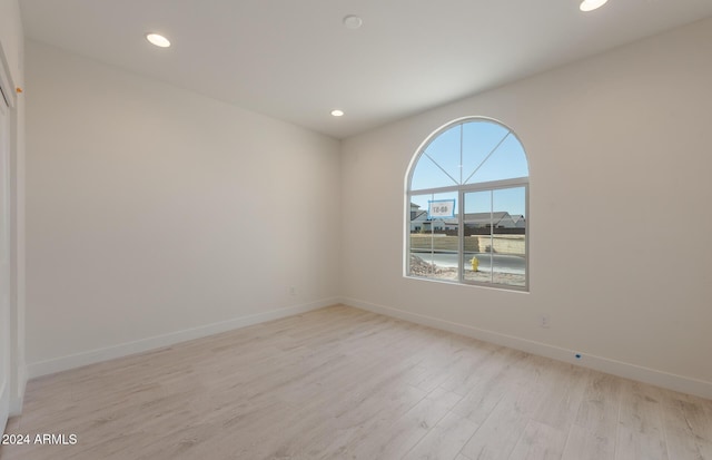 empty room featuring light hardwood / wood-style floors