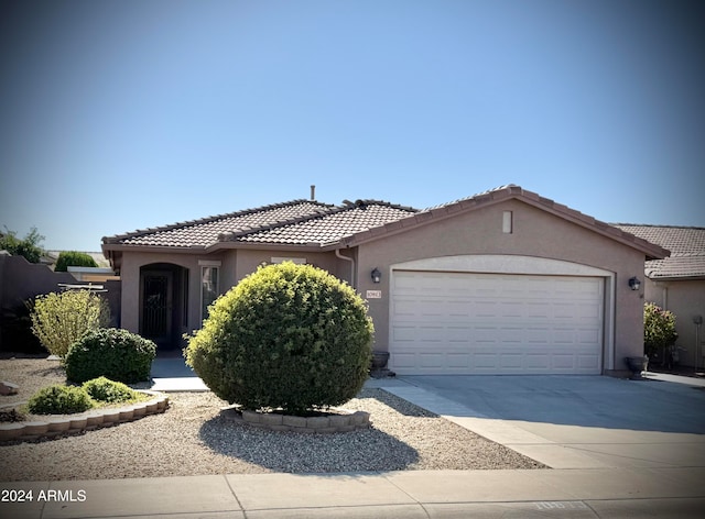 view of front of property featuring a garage