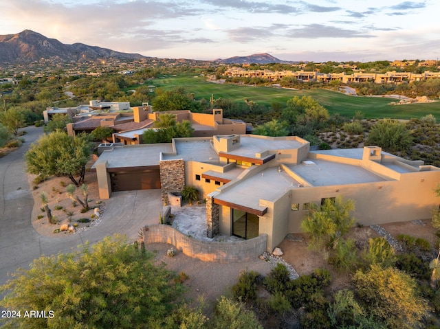 aerial view at dusk with a mountain view