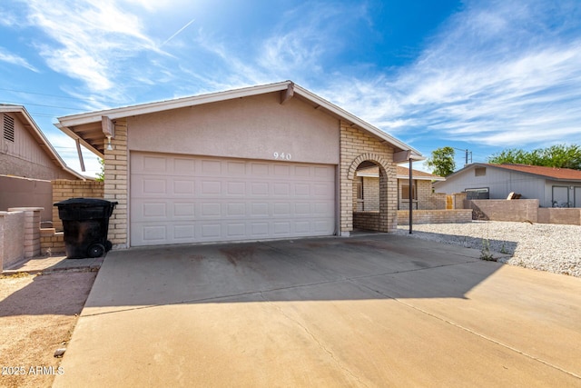 940 S Revere, Mesa, AZ 85210 - ranch-style home with driveway, stucco siding, and an attached garage