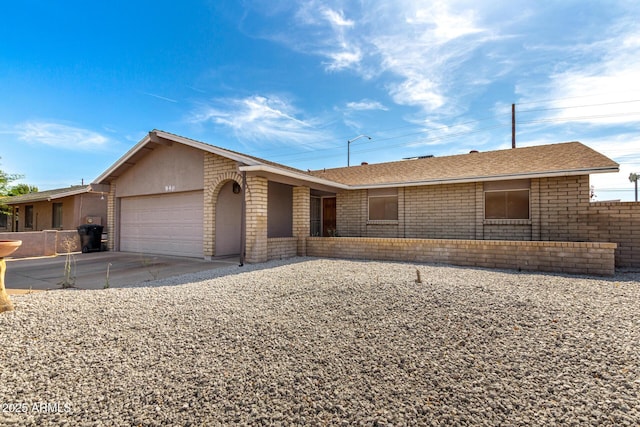 940 S Revere, Mesa, AZ 85210 - ranch-style house featuring a garage, concrete driveway, and stucco siding