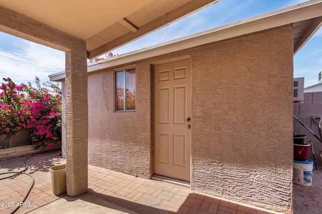 940 S Revere, Mesa, AZ 85210 - entrance to property featuring a patio area and stucco siding