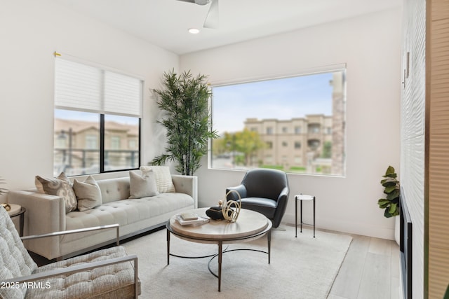 5250 E Deer Valley Dr Unit 140, Phoenix, AZ 85054 - living area with ceiling fan, wood finished floors, and recessed lighting