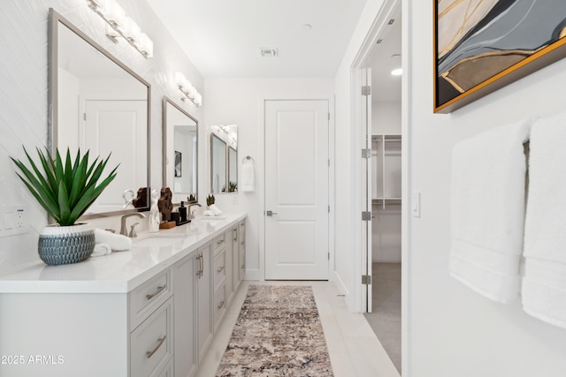 5250 E Deer Valley Dr Unit 140, Phoenix, AZ 85054 - full bathroom with double vanity and a walk in closet