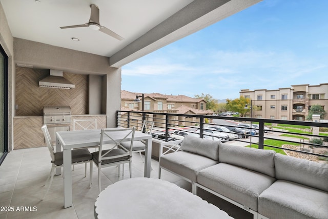 5250 E Deer Valley Dr Unit 140, Phoenix, AZ 85054 - balcony featuring an outdoor hangout area, a ceiling fan, outdoor dining area, exterior kitchen, and a residential view