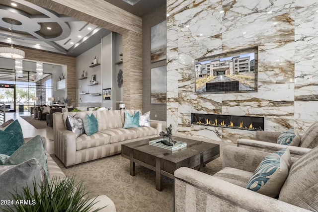 5250 E Deer Valley Dr Unit 140, Phoenix, AZ 85054 - living room featuring a high ceiling, coffered ceiling, a premium fireplace, beamed ceiling, and recessed lighting