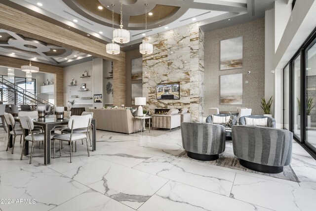 5250 E Deer Valley Dr Unit 140, Phoenix, AZ 85054 - dining area featuring a high ceiling, coffered ceiling, plenty of natural light, recessed lighting, and a stone fireplace