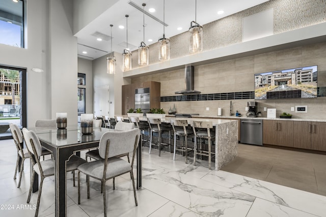 5250 E Deer Valley Dr Unit 140, Phoenix, AZ 85054 - dining space with a towering ceiling and recessed lighting