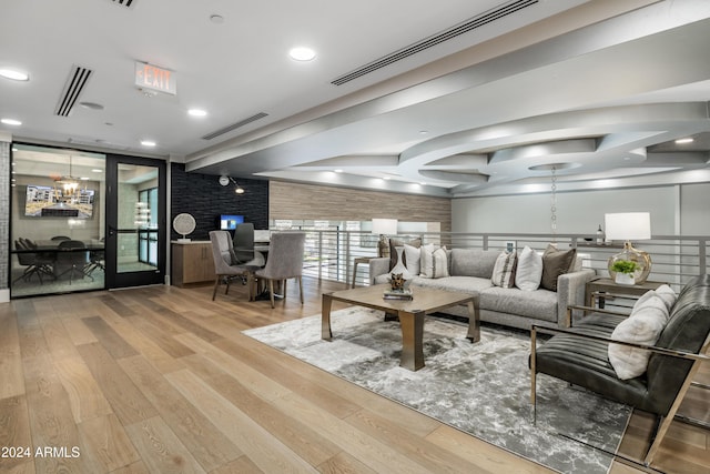 5250 E Deer Valley Dr Unit 140, Phoenix, AZ 85054 - living room with wood finished floors, beamed ceiling, and recessed lighting