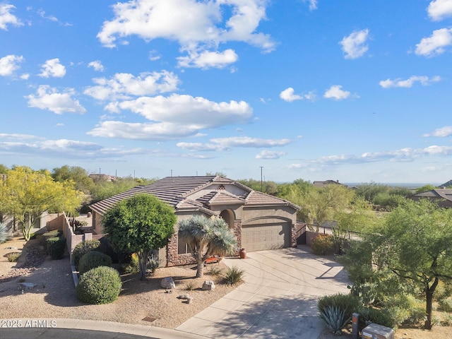 view of front facade featuring driveway, a tile roof, a garage, fence, and stucco siding