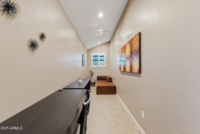 hall with vaulted ceiling, baseboards, a textured wall, recessed lighting, and light tile patterned flooring