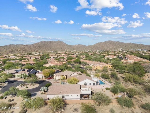 birds eye view of property with a residential view and a mountain view