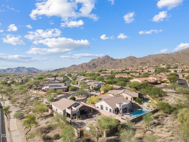 drone / aerial view featuring a mountain view and a residential view