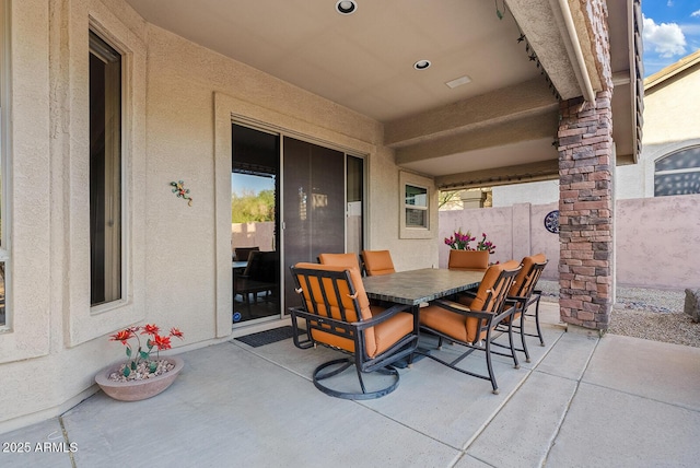 view of patio / terrace with fence and outdoor dining space