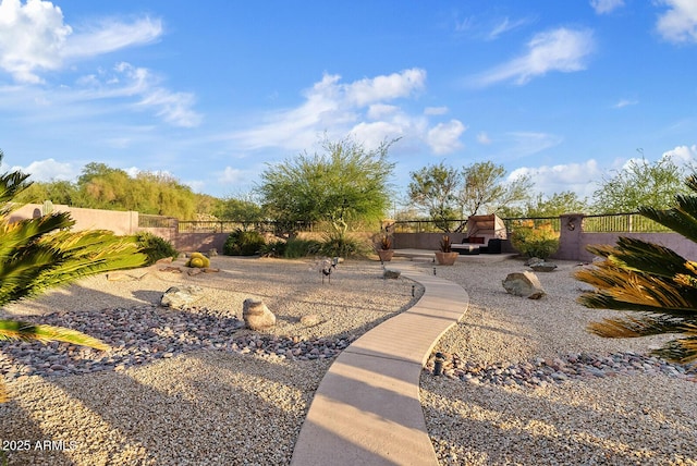 view of yard with fence