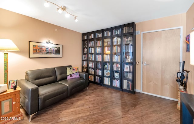 living area with wood-type flooring