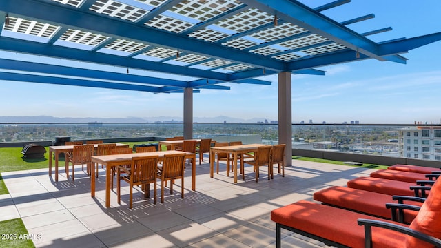 view of patio with a pergola and a mountain view