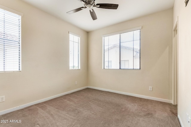 2315 N 52nd St Unit 144, Phoenix, AZ 85008 - spare room with carpet, baseboards, and a ceiling fan
