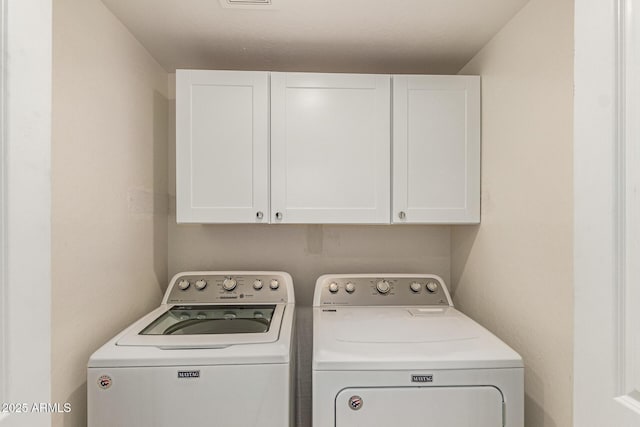 2315 N 52nd St Unit 144, Phoenix, AZ 85008 - washroom featuring cabinet space and washing machine and clothes dryer