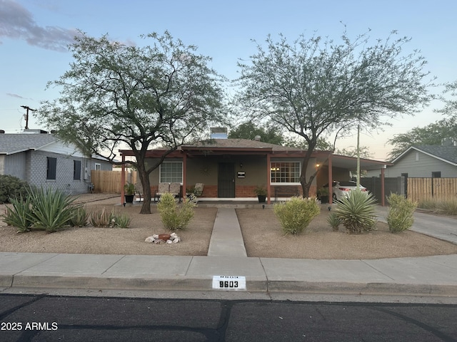 9603 N 1st Ave, Phoenix, AZ 85021 - ranch-style house featuring a porch and brick siding