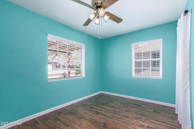 9603 N 1st Ave, Phoenix, AZ 85021 - unfurnished room with baseboards, dark wood-style floors, and ceiling fan