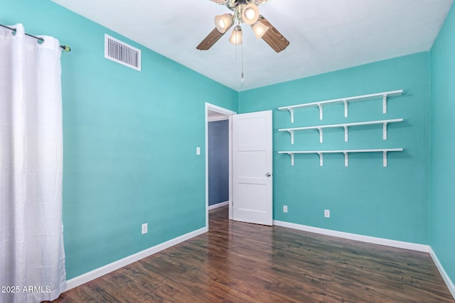 9603 N 1st Ave, Phoenix, AZ 85021 - spare room featuring a ceiling fan, wood finished floors, and baseboards