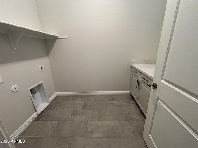 washroom featuring baseboards and electric dryer hookup