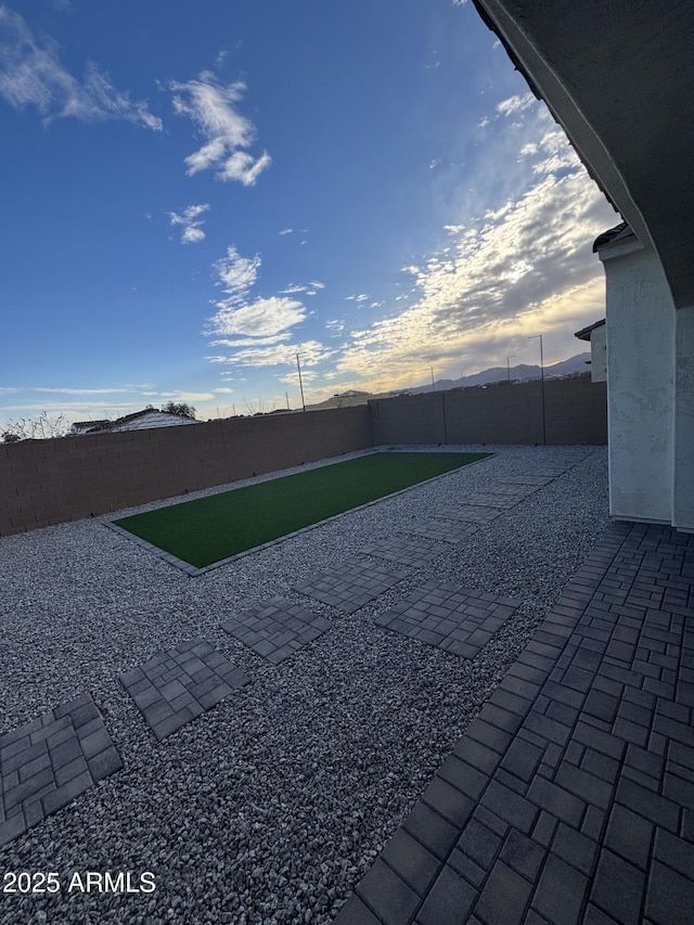 view of patio with a fenced backyard