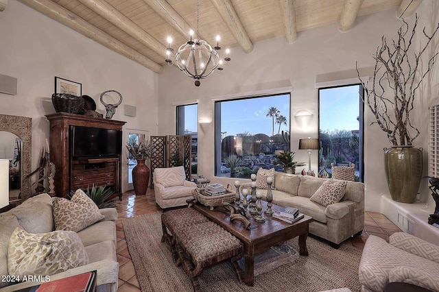 tiled living room featuring wood ceiling, beamed ceiling, high vaulted ceiling, and a notable chandelier