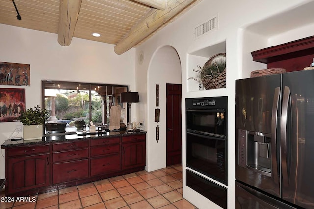 kitchen featuring double oven, wood ceiling, beamed ceiling, refrigerator with ice dispenser, and light tile patterned floors