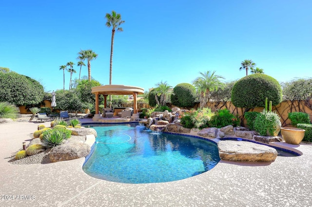 view of pool featuring a patio and pool water feature