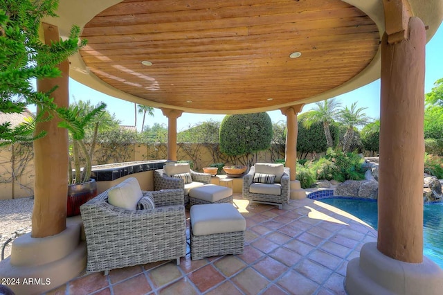 view of patio with a fenced in pool